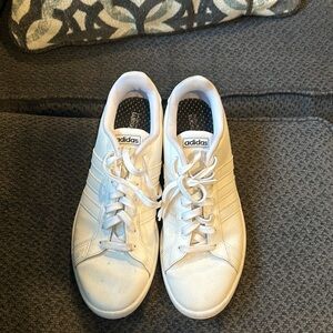 Men’s size 11.5 all white Adidas shoes. Excellent condition.